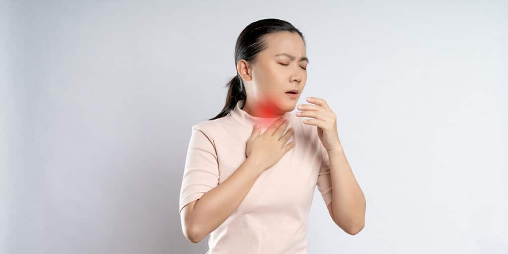 what sti causes sore throat